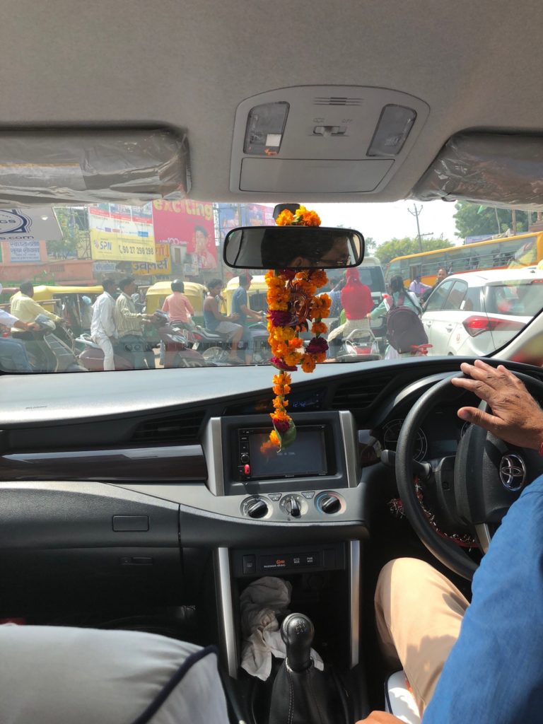 The traffic leaving Agra is just as bad as it was in Delhi