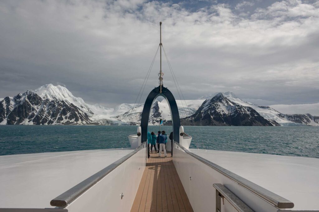 The Antarctic Peninsula, also referred to as Tierra de O'Higgins in Chile, Tierra de San Martin in Argentina, and previously known as Graham Land in the United Kingdom, is the most northerly region of the central part of Antarctica.